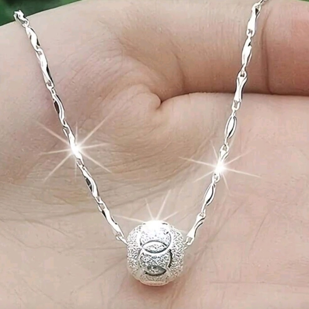 Elegant sterling silver necklace spinning bead pendant plus gift box